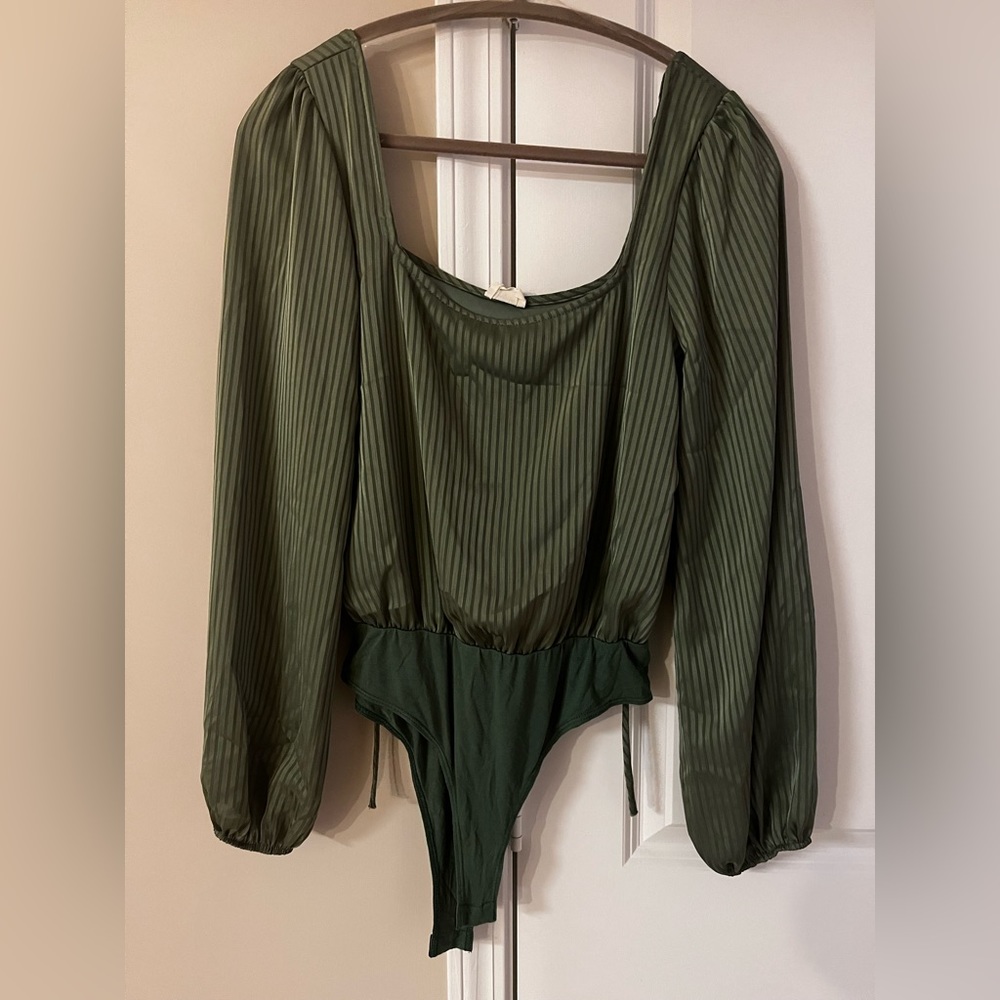 Green silk bodysuit, long puffy sleeve. Barely worn, like new.